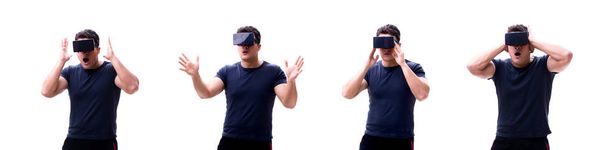 Young handsome man wearing virtual reality VR glasses isolated o - Photo, Image