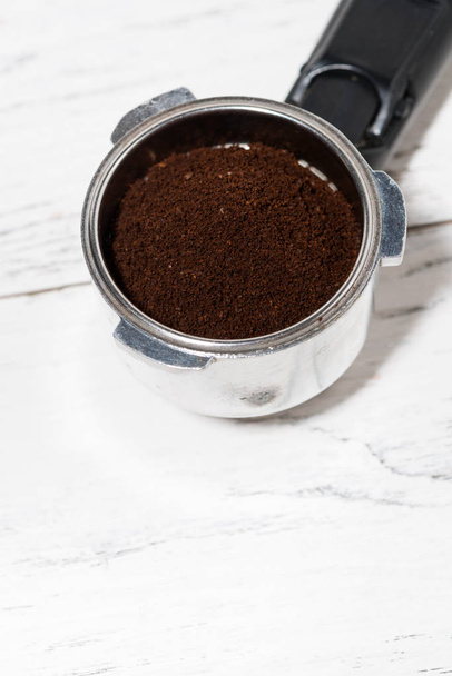holder with ground coffee for coffee machine, top view - Foto, afbeelding