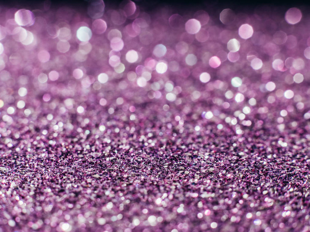 Background sequin. sequin BACKGROUND. glitter surfactant. Holiday abstract glitter background with blinking lights. Fabric sequins in bright colors. Fashion fabric glitter, sequins. Defocused. - Photo, Image