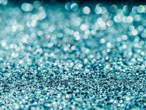 Background sequin. sequin BACKGROUND. glitter surfactant. Holiday abstract glitter background with blinking lights. Fabric sequins in bright colors. Fashion fabric glitter, sequins. Defocused. - Fotoğraf, Görsel