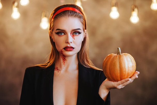 Beautiful Halloween Vampire Woman portrait. Mysterious Model girl with Halloween make up - Fotoğraf, Görsel