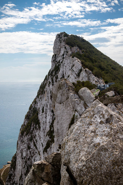 The summit of the Rock of Gibraltar looking South towards Africa . Gibraltar is a British Overseas Territory located on the southern tip of Spain. - Foto, immagini