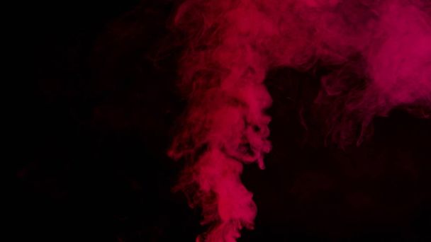 πολύχρωμος καπνός σε σκούρο φόντο - Φωτογραφία, εικόνα