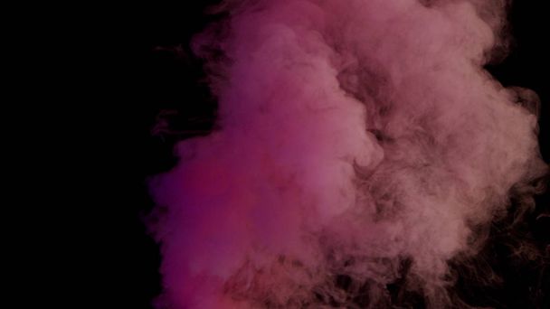 Colorful Smoke on Dark Background - Photo, image