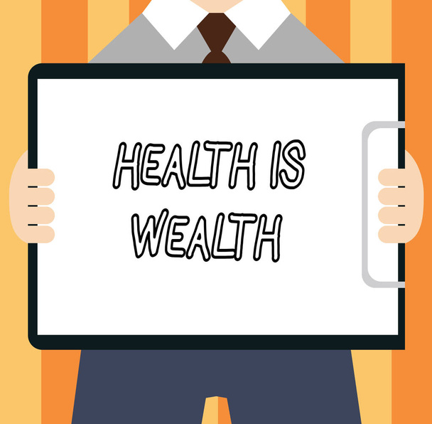 Texto de escritura de palabras Salud es riqueza. Concepto de negocio para ser saludable es más importante que ser rico
. - Foto, Imagen