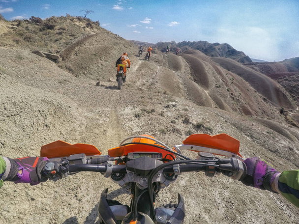 Enduro journey with dirt bike in high mountains in Caucasus nature - 写真・画像