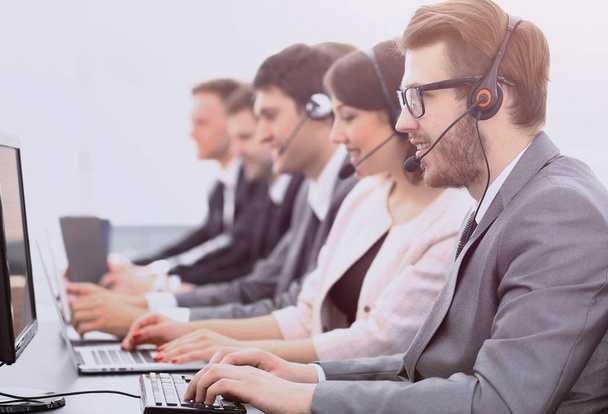 colleagues call centre workplace in the office - Foto, Imagem