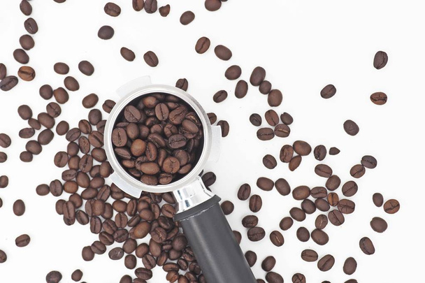 handle filled ground coffee on white background - Photo, Image
