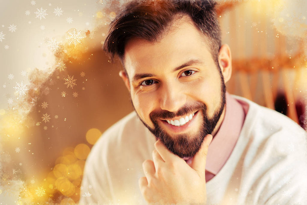 Emotional bearded handsome man feeling very positive after date with girlfriend - Zdjęcie, obraz