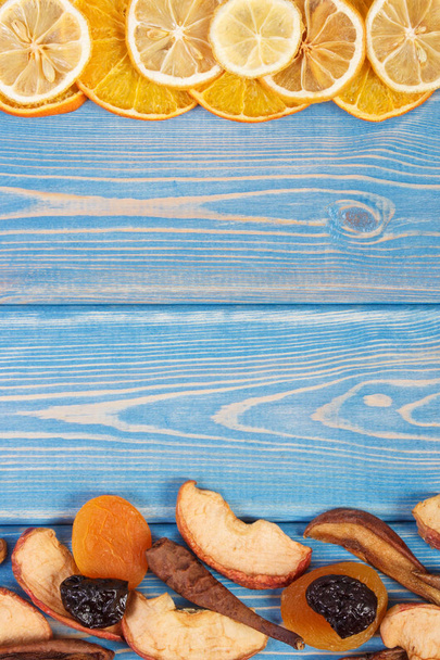 Frame of dried fruits for preparing beverage or compote, place for text or inscription on boards - 写真・画像