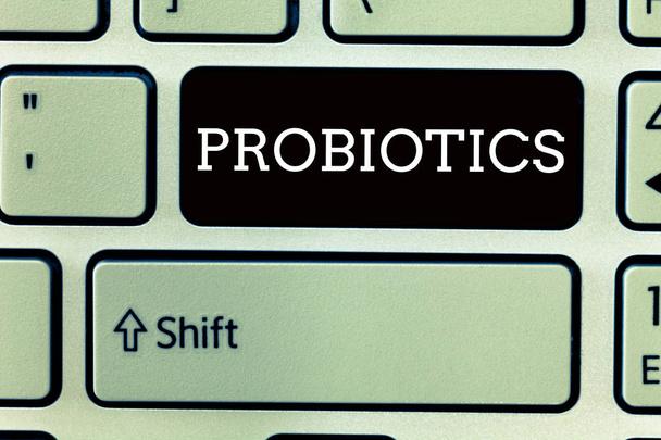Текстовий знак, що показує пробіотики. Концептуальна фотографія Живі бактерії Мікроорганізми, розміщені в організмі за свої переваги
 - Фото, зображення