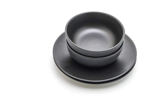 empty black plate and bowl isolated on white background - Foto, Imagem