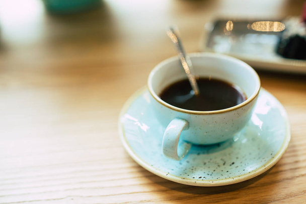 Fresh cup of coffee on wooden table  - Φωτογραφία, εικόνα