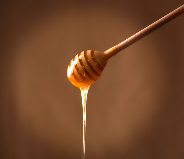 木製蜂蜜ディッパー - 写真・画像