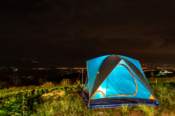 Tent and background sky and mountain views at night. - Photo, Image