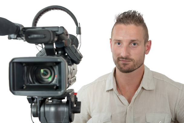 kameraman s profesionální videokamery izolovaných na bílém pozadí - Fotografie, Obrázek