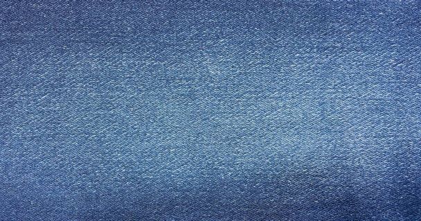 青色の背景は、デニム ジーンズの背景。デニム生地のジーンズ テクスチャ - 写真・画像