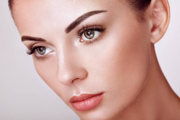 Beautiful Woman with Extreme Long False Eyelashes. Eyelash Extensions. Makeup, Cosmetics. Beauty, Skincare - Фото, зображення