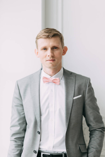 Stylish modern groom before the wedding. Portrait of a man in a suit. - Valokuva, kuva