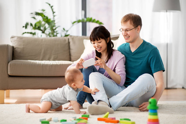 happy family with baby boy at home - Photo, Image