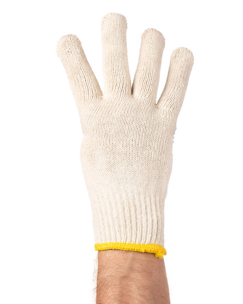 Ανδρικό χέρι που φοράει γάντι εργασίας - Φωτογραφία, εικόνα