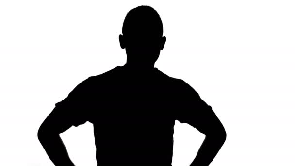 silhouette dell'uomo con le braccia incrociate
 - Filmati, video