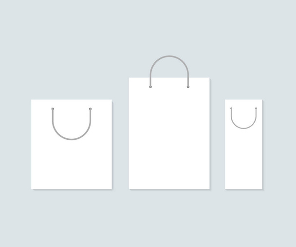 3 つのホワイト ペーパー ショッピング バッグのセットです。ベクトル図. - ベクター画像