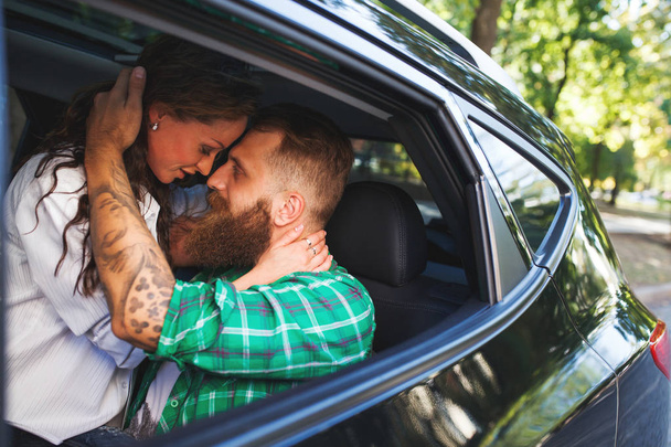 Couple make love in the car. - Foto, imagen