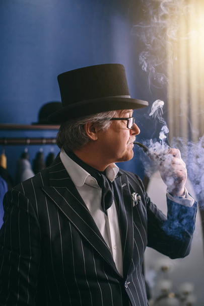 Portrait of posh mature gentleman visiting a tailors shop - Valokuva, kuva