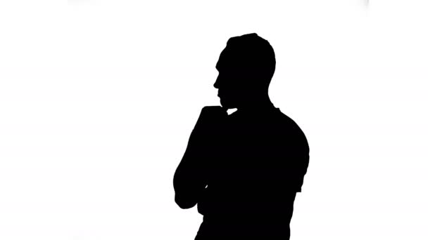 Silhouette of hearing man with forefinger - Πλάνα, βίντεο