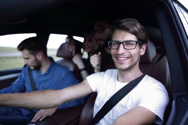 Close up side portrait of happy man driving car - Photo, image
