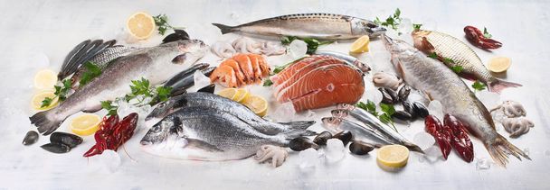 assortment of fresh fish and seafood. healthy eating concept - Photo, image