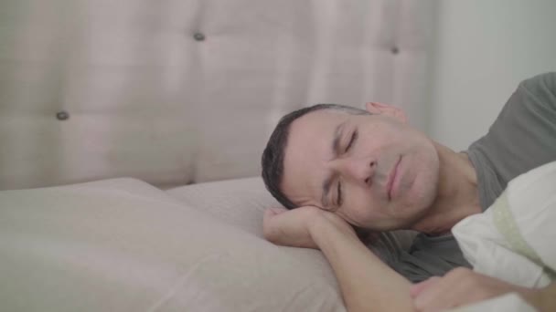 Happy guy wakes up Close up in slow motion  - Footage, Video