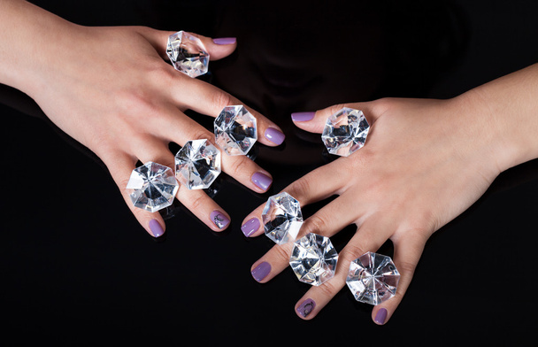 Close-up Of Woman's Hand And Diamonds - Foto, afbeelding