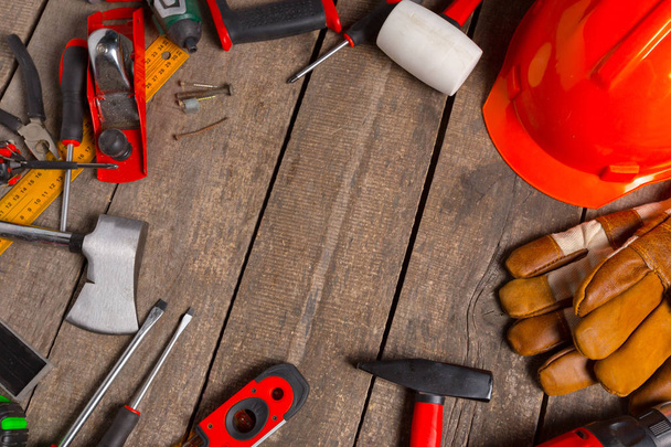 Different work tools on wood background - Photo, image