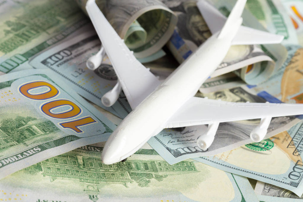 close up of toy airplane on the money - Fotó, kép