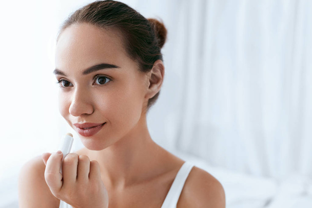 Lips Skin Care. Beautiful Woman Applying Lip Balm. Beauty - Photo, image