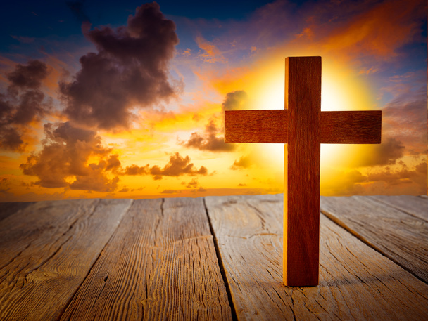 Christian wood cross on sunset sky wooden made - Zdjęcie, obraz