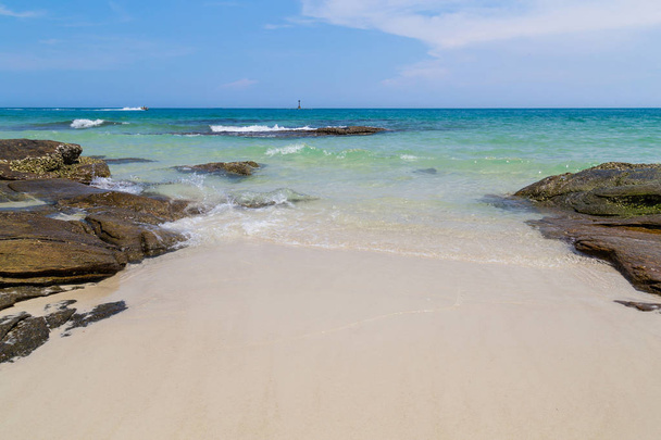 sandy  beach and sea   in a sunny day of summer - Фото, зображення