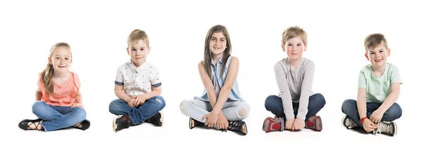 A Group Of five Young Children In Studio - Foto, Bild