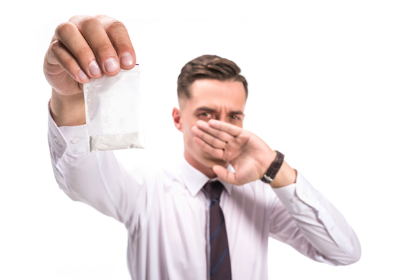 selective focus of businessman rejecting cocaine isolated on white - Photo, Image