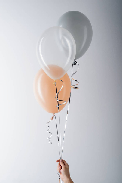 Balloons on light grey background - Foto, imagen
