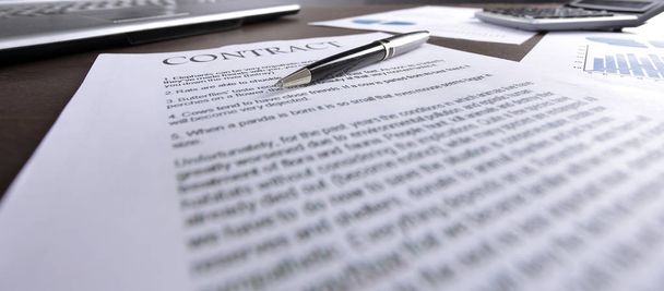 blurred image of a sheet with a contract on a Desk - Fotoğraf, Görsel