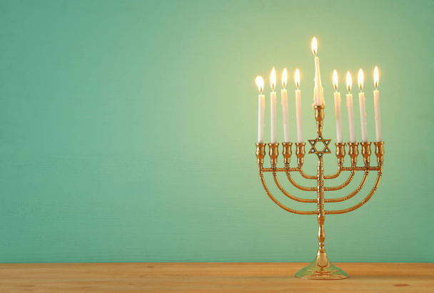 image of jewish holiday Hanukkah background with menorah (traditional candelabra) and candles. - Zdjęcie, obraz