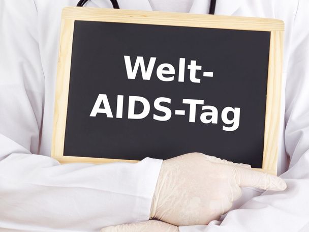 Blackboard : World AIDS Day : German language - Photo, Image