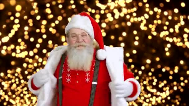 Old funny Santa Claus is dancing. - Footage, Video