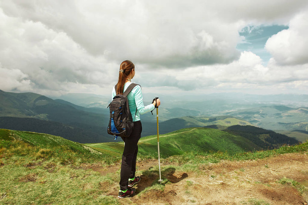 woman hiker enjoying the view of mountains landscape. Carpathians, Ukraine - Zdjęcie, obraz