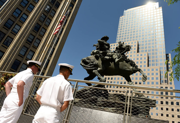 New York, USA - May 24, 2018: US Navy sailors during visiting the America's Response Monument in Liberty Park near NYC 9/11 Memorial in New York. - Фото, изображение