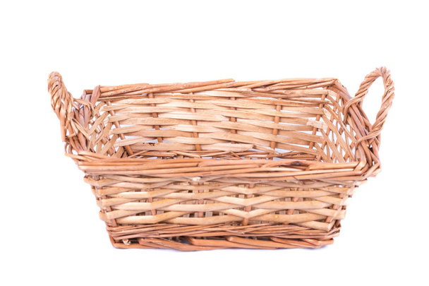 small wooden basket on a white background in studio - Photo, Image