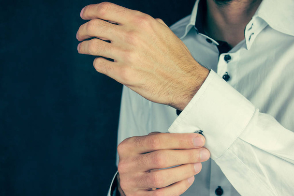 Male buttons cufflinks. Businessman buttons cufflinks in  - Zdjęcie, obraz